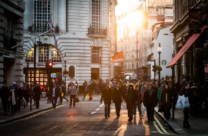 Larger city sunny people street